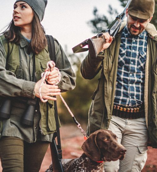 Men and women hunting in nature